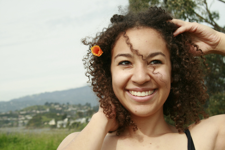 Curly Girl with Flower